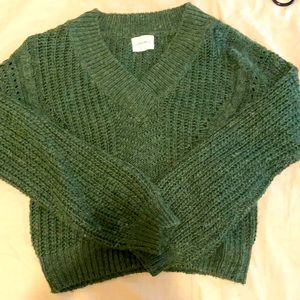green knit sweater
